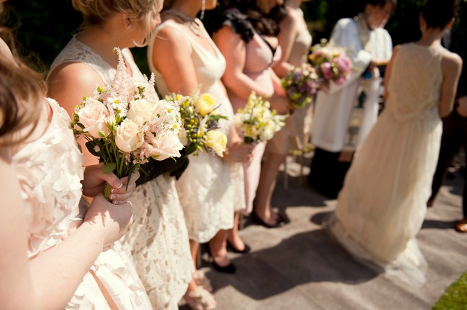 bridesmaids in cream mixed
